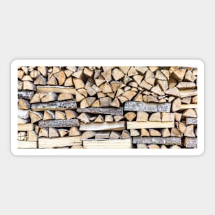 Chopped wood piled in a wood stack Sticker